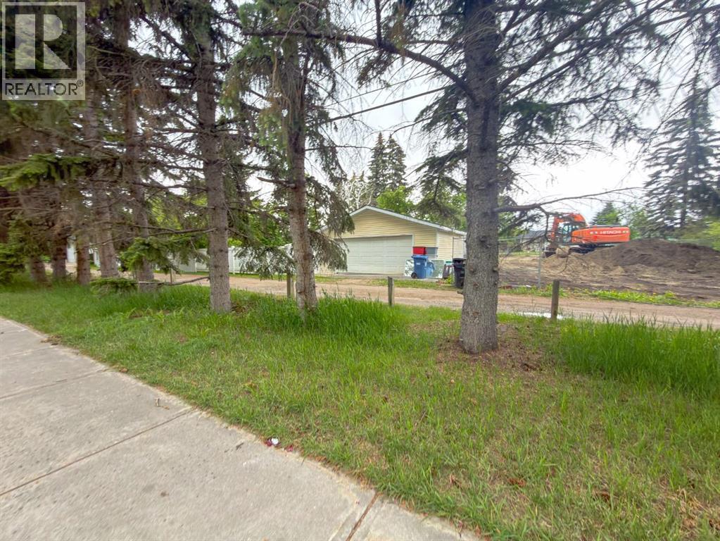 2115 Halifax Crescent Nw, Calgary, Alberta  T2M 4C8 - Photo 25 - A2319603