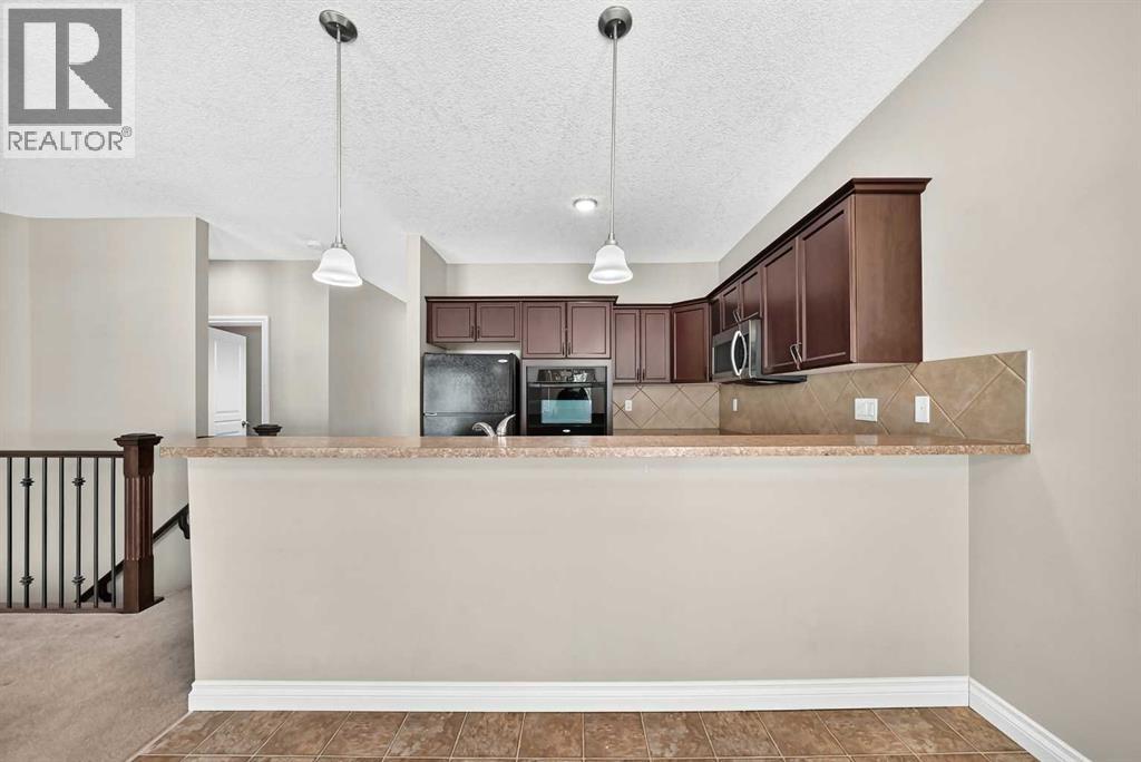 114 Tucker Circle, Okotoks, Alberta  T1S 2J8 - Photo 13 - A2320862