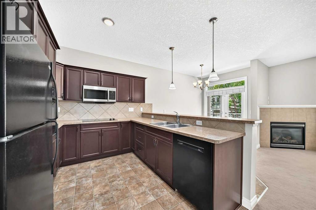 114 Tucker Circle, Okotoks, Alberta  T1S 2J8 - Photo 10 - A2320862