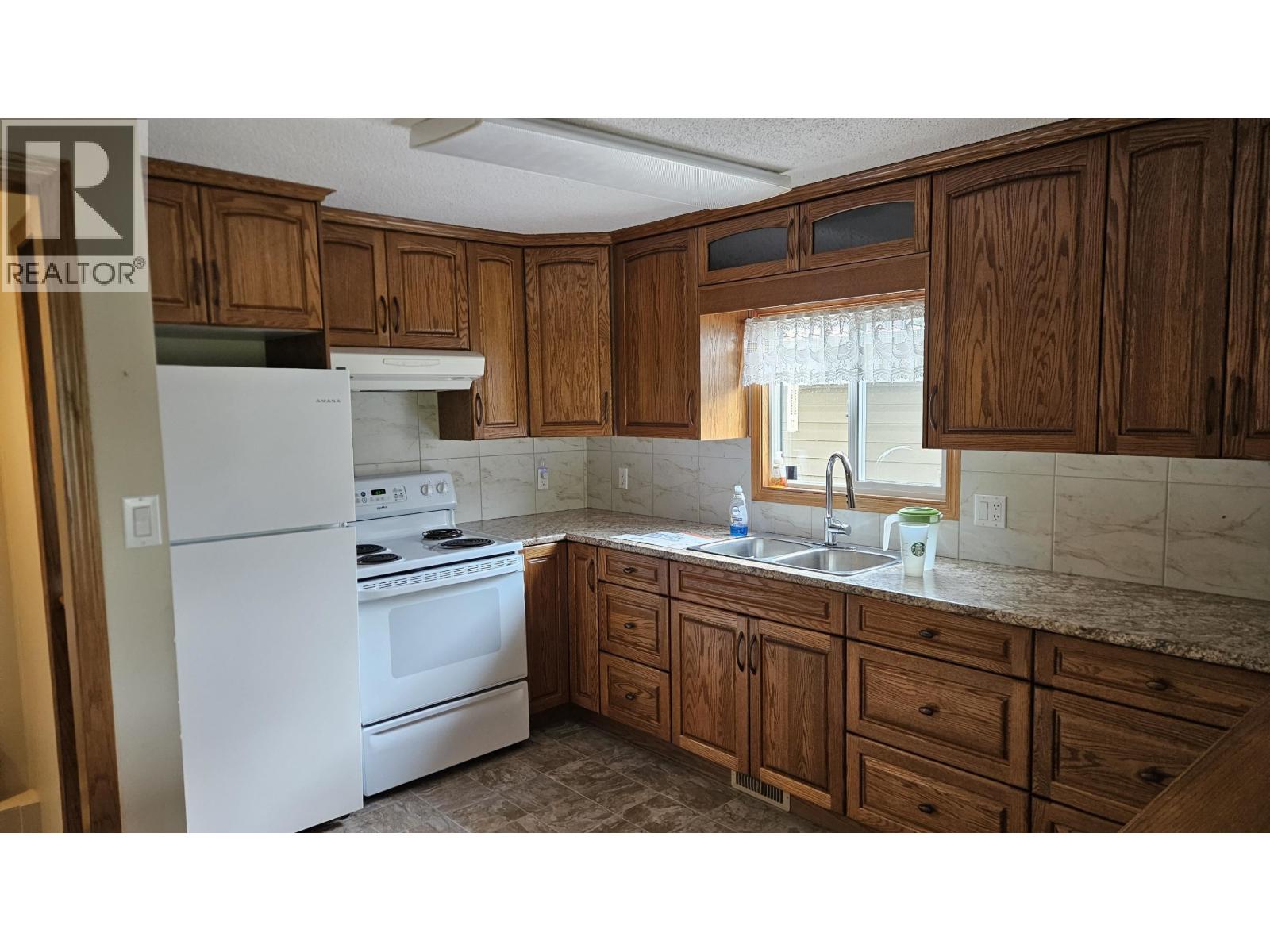 9204 99 Avenue, Fort St. John, British Columbia  V1J 1T2 - Photo 2 - R3134817