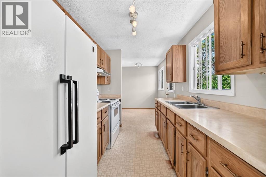 103 Rivervalley Crescent Se, Calgary, Alberta  T2C 3K4 - Photo 5 - A2321607