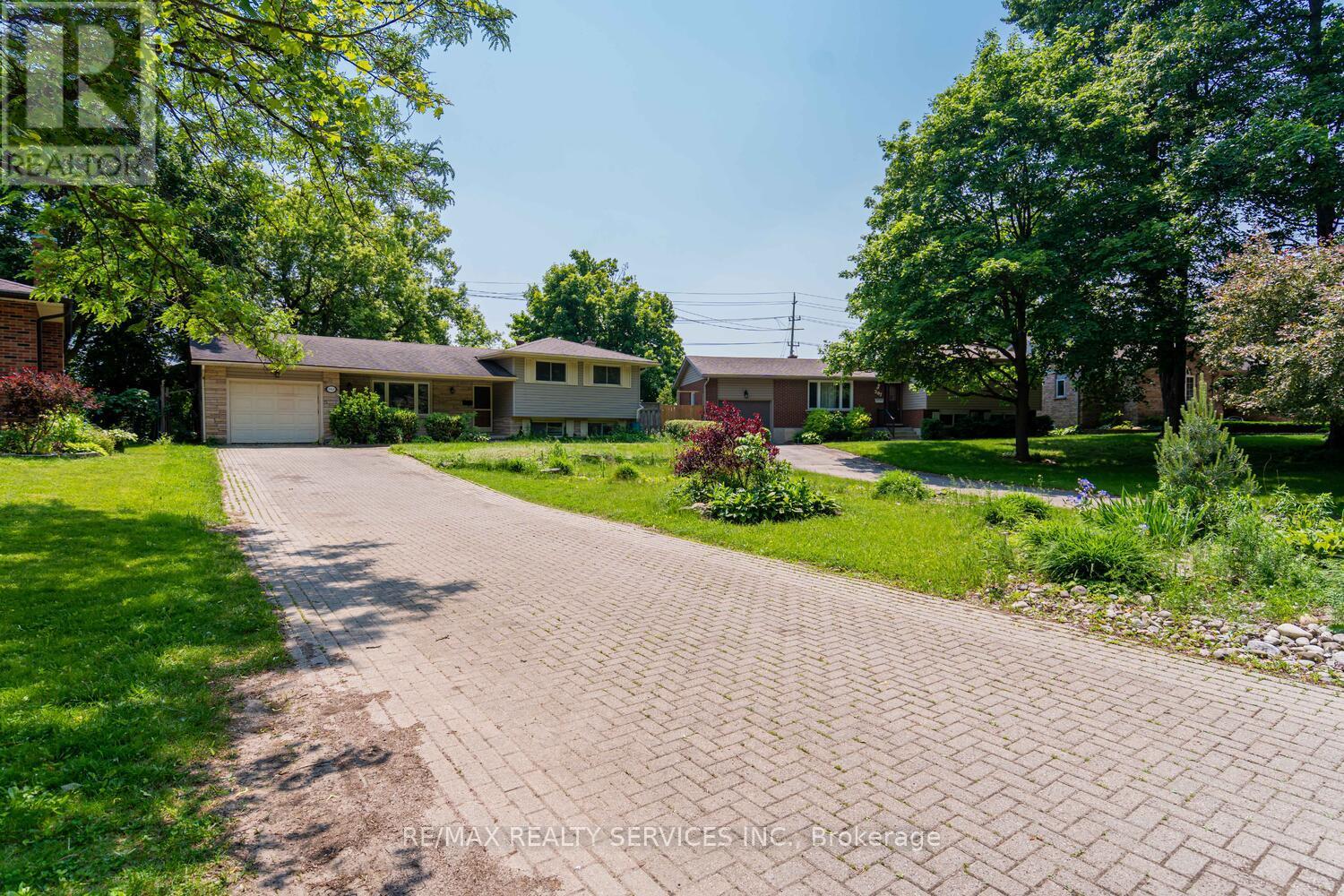 285 Thorncrest Drive, Waterloo, Ontario  N2L 4L2 - Photo 3 - X13467464