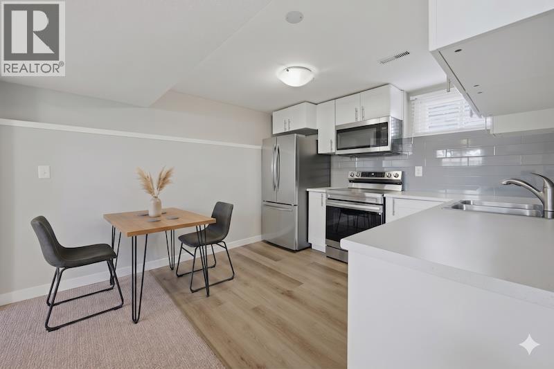 7115 Huntercrest Road NW, Calgary, Alberta  T2K 4J9 - Photo 17 - A2317206