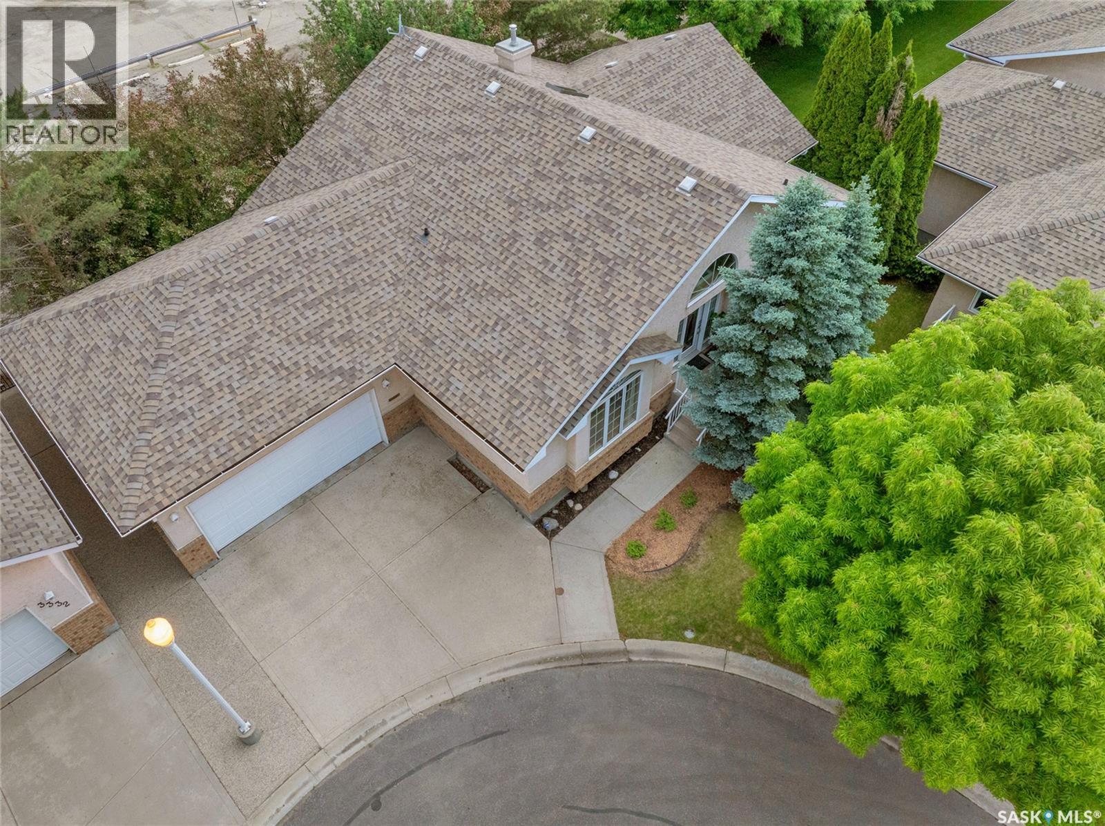 3328 Lakeshore Court, Regina, Saskatchewan  S4S 7H8 - Photo 3 - SK040086