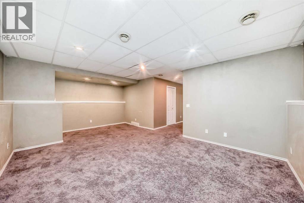 137 Erin Meadow Bay SE, Calgary, Alberta  T2B 3A2 - Photo 26 - A2316817