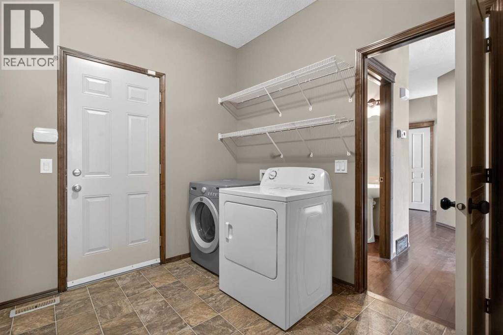139 Panamount Street NW, Calgary, Alberta  T3K 6J9 - Photo 5 - A2319709