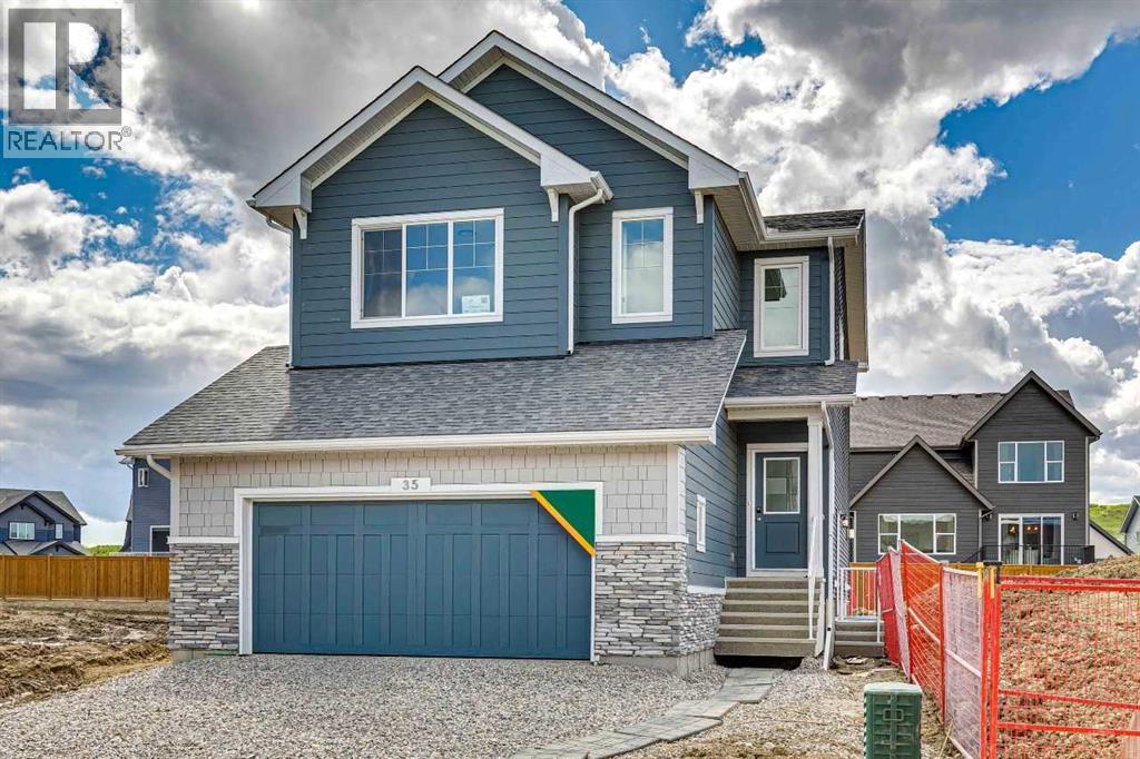 35 Creekside Rise SW, Calgary, Alberta T2X 5V9 - Photo 2 - A2322503
