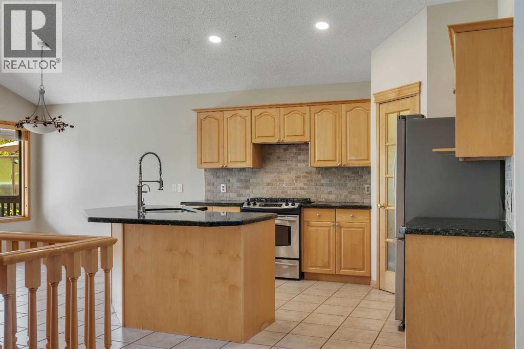 10272 Tuscany Hills Way, Calgary, Alberta  T3L 2G5 - Photo 10 - A2322560