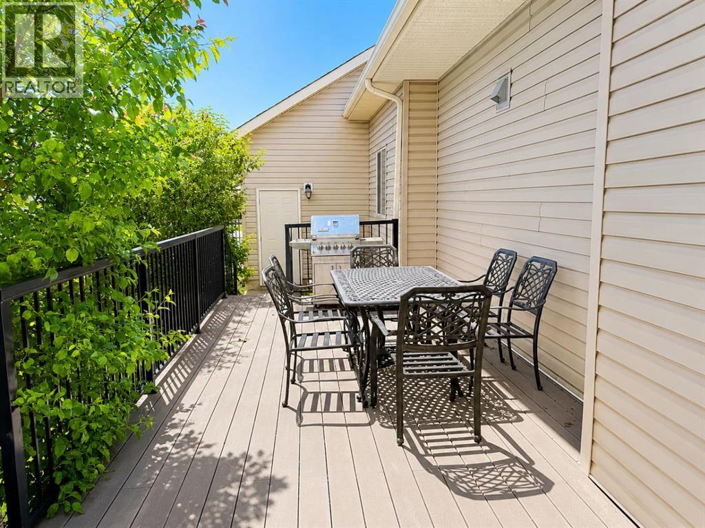 151 Hawkmere View, Chestermere, Alberta  T1X 1T8 - Photo 4 - A2320032