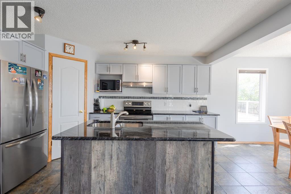 124 Tuscany Hills Park Nw, Calgary, Alberta  T3L 2A3 - Photo 5 - A2319945