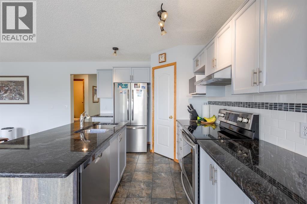 124 Tuscany Hills Park Nw, Calgary, Alberta  T3L 2A3 - Photo 7 - A2319945