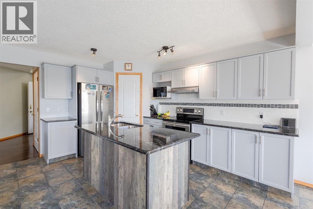 124 Tuscany Hills Park Nw, Calgary, Alberta  T3L 2A3 - Photo 6 - A2319945