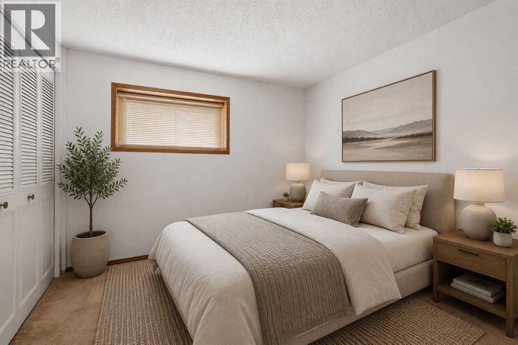 27 Woodgreen Place SW, Calgary, Alberta  T2W 4A3 - Photo 25 - A2321722