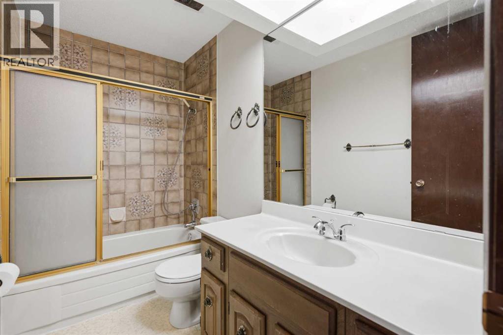 27 Woodgreen Place SW, Calgary, Alberta  T2W 4A3 - Photo 22 - A2321722