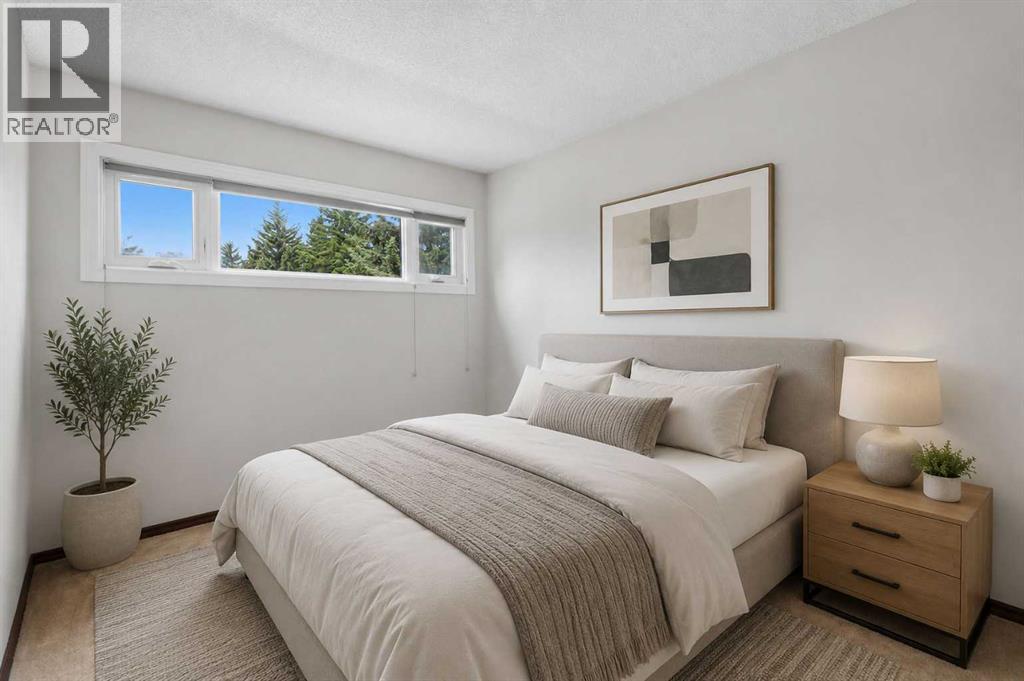 27 Woodgreen Place SW, Calgary, Alberta  T2W 4A3 - Photo 20 - A2321722