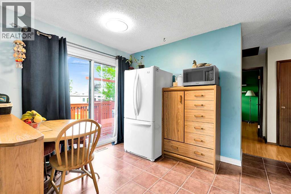 244 Travis Place NE, Calgary, Alberta  T2K 3W4 - Photo 11 - A2317176
