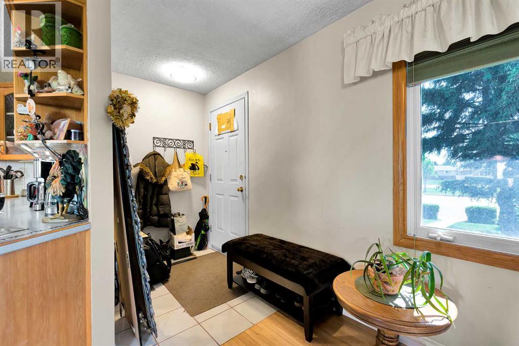 244 Travis Place NE, Calgary, Alberta  T2K 3W4 - Photo 4 - A2317176