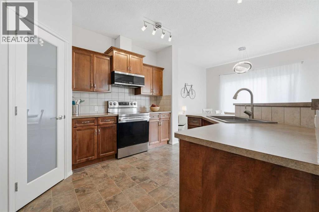 142 Bridlerange Place Sw, Calgary, Alberta  T2Y 0K8 - Photo 9 - A2314139