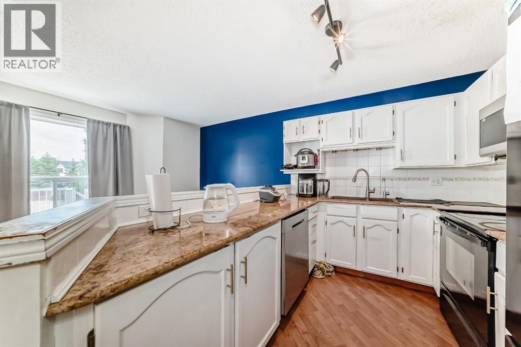 325 Mt Douglas Manor SE, Calgary, Alberta  T2Z 3C8 - Photo 5 - A2318795