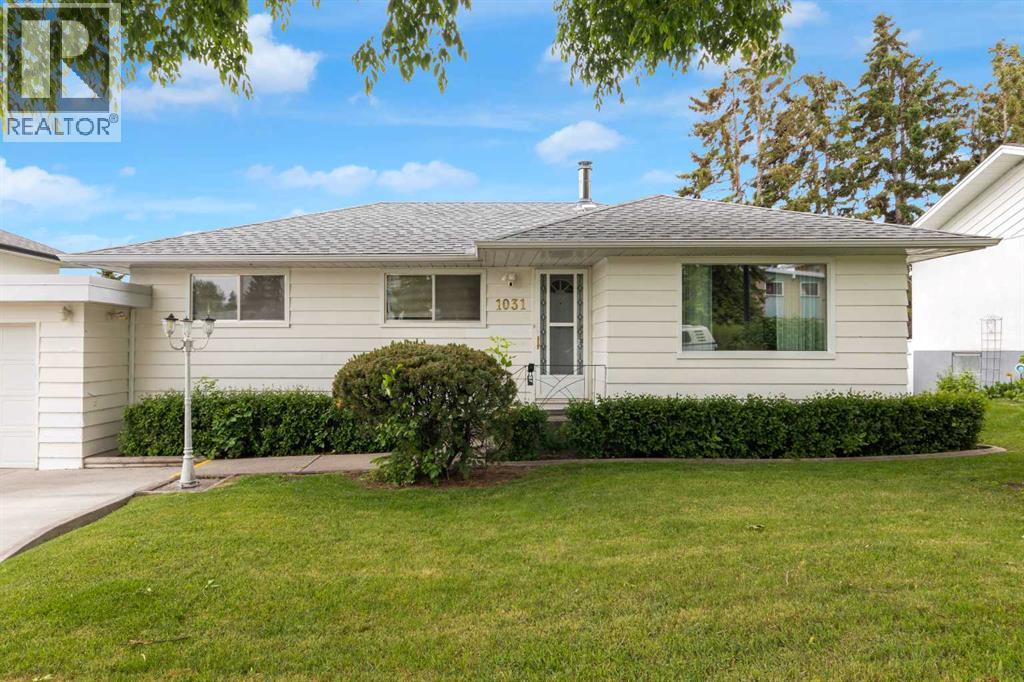 1031 Thorneycroft Drive Nw, Calgary, Alberta  T2K 3K7 - Photo 2 - A2309461