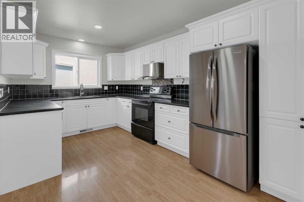 51 Ranchridge Drive NW, Calgary, Alberta  T3G 1V9 - Photo 7 - A2321920