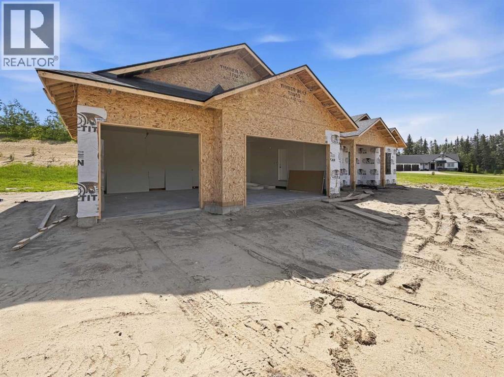 148 Burbank Heights, Rural Lacombe County, Alberta  T0M 0J0 - Photo 4 - A2315786