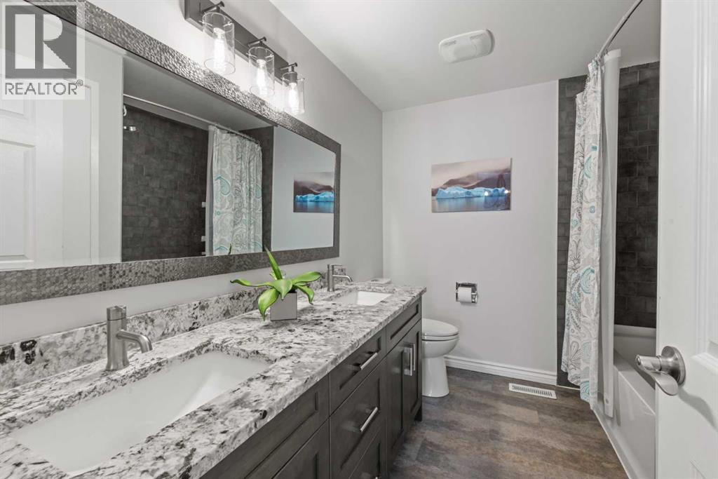 1141 Ninga Road NW, Calgary, Alberta  T2K 2P2 - Photo 16 - A2318600