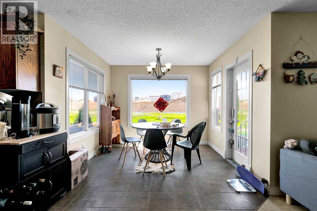 77 Silverado Creek Crescent SW, Calgary, Alberta  T2X 0C6 - Photo 9 - A2319350