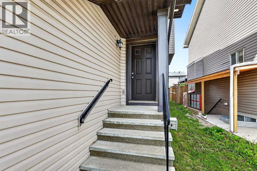 490 New Brighton Drive Se, Calgary, Alberta  T2Z 0K1 - Photo 2 - A2318773