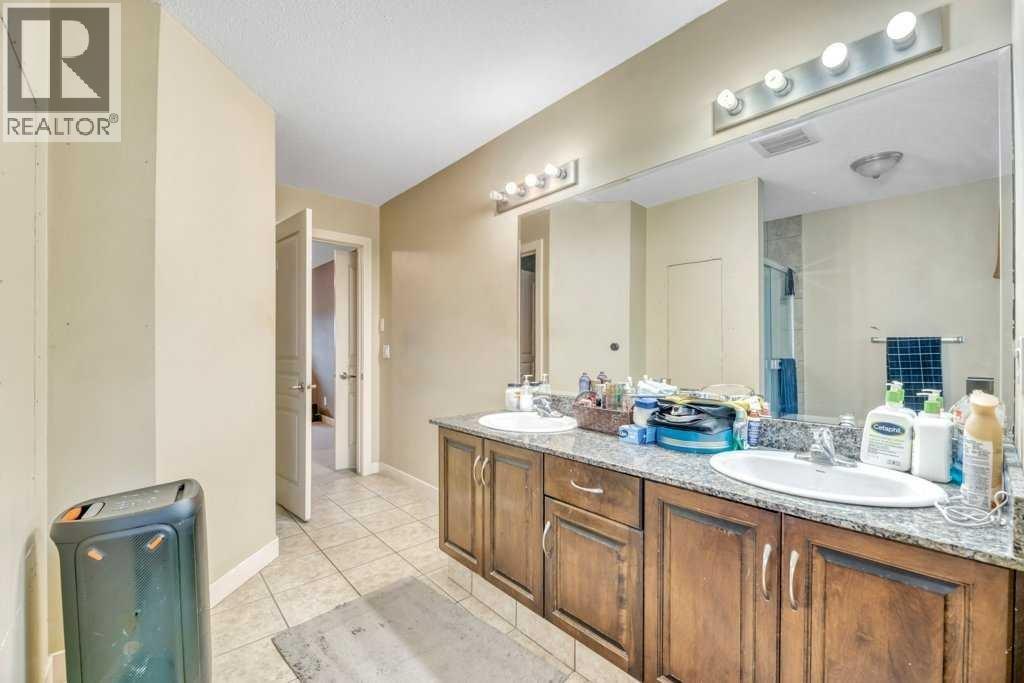 113 Cove Hill, Chestermere, Alberta  T3A 6B5 - Photo 36 - A2321705
