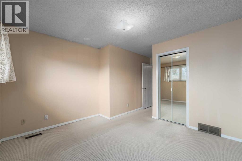 1455 Berkley Drive NW, Calgary, Alberta  T3K 1T6 - Photo 21 - A2318714