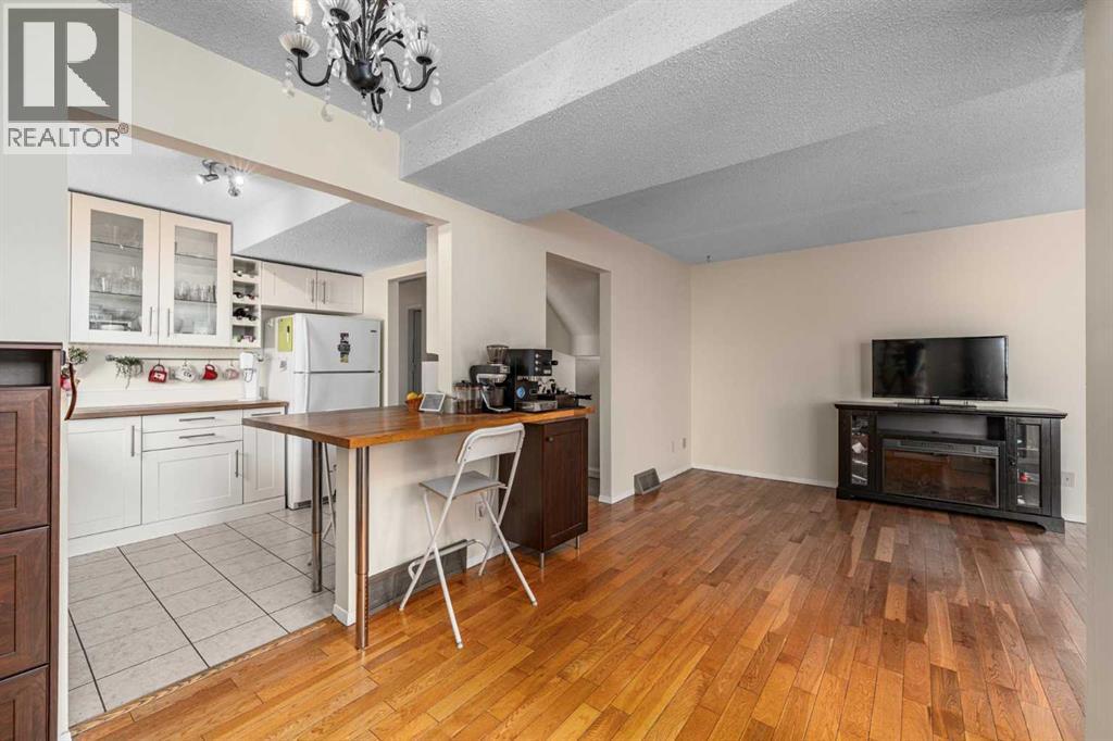 1455 Berkley Drive NW, Calgary, Alberta  T3K 1T6 - Photo 9 - A2318714