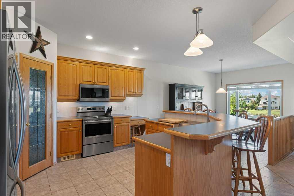 1103 Highland Green View NW, High River, Alberta  T1V 1V8 - Photo 7 - A2319585