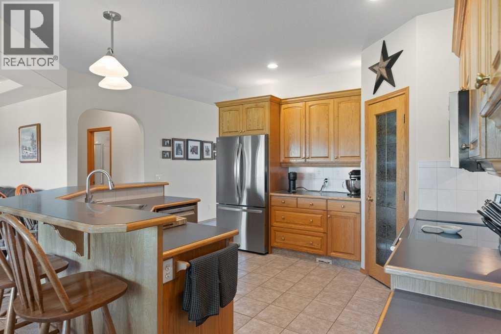 1103 Highland Green View NW, High River, Alberta  T1V 1V8 - Photo 9 - A2319585