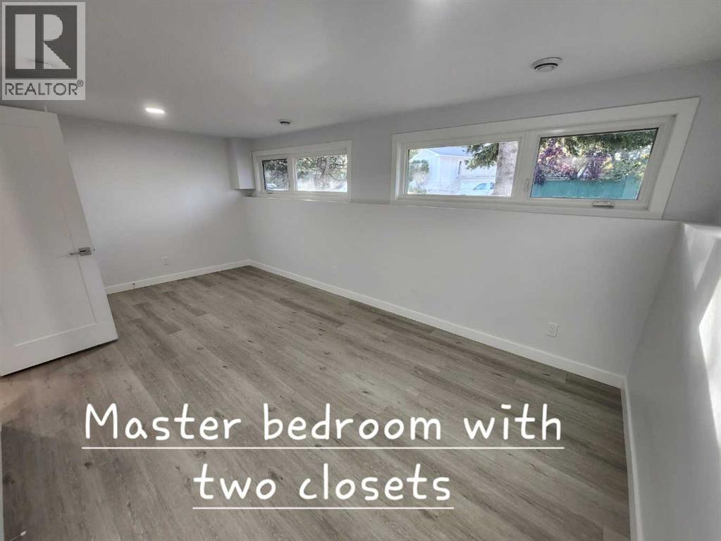 12108 Lake Waterton Way SE, Calgary, Alberta  T2J 2M4 - Photo 30 - A2318605