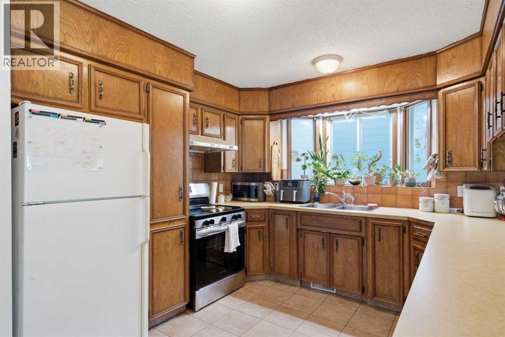20 Berkshire Court Nw, Calgary, Alberta  T3K 1Z5 - Photo 14 - A2320921