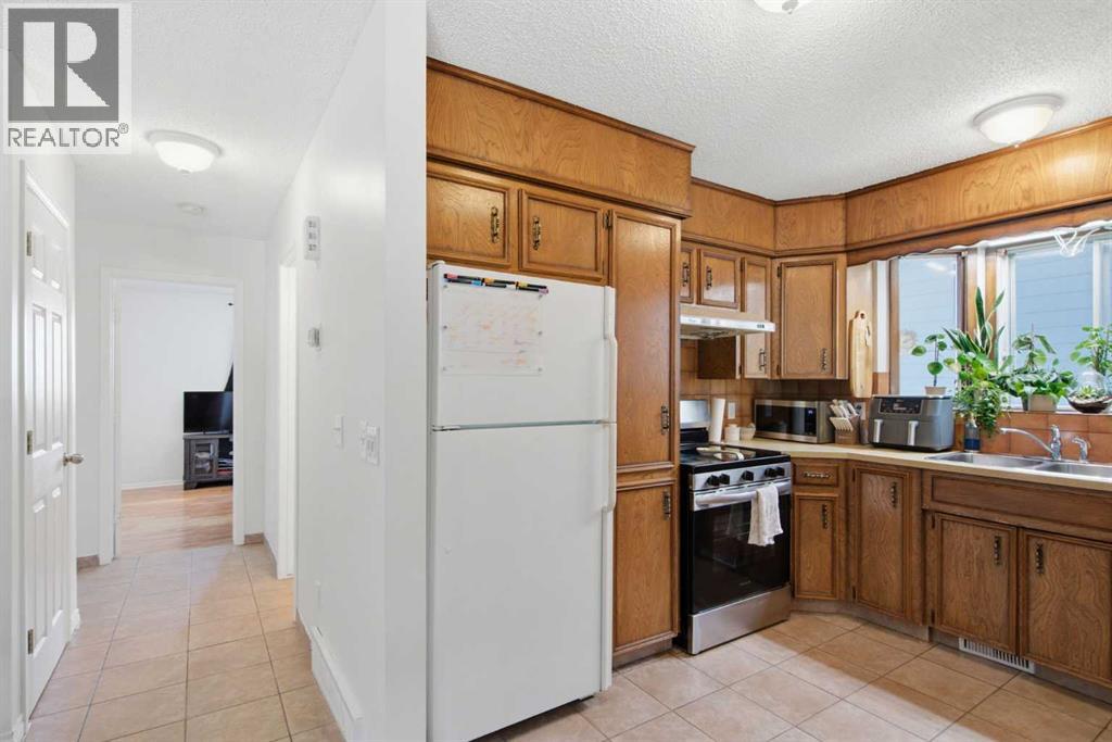 20 Berkshire Court Nw, Calgary, Alberta  T3K 1Z5 - Photo 16 - A2320921