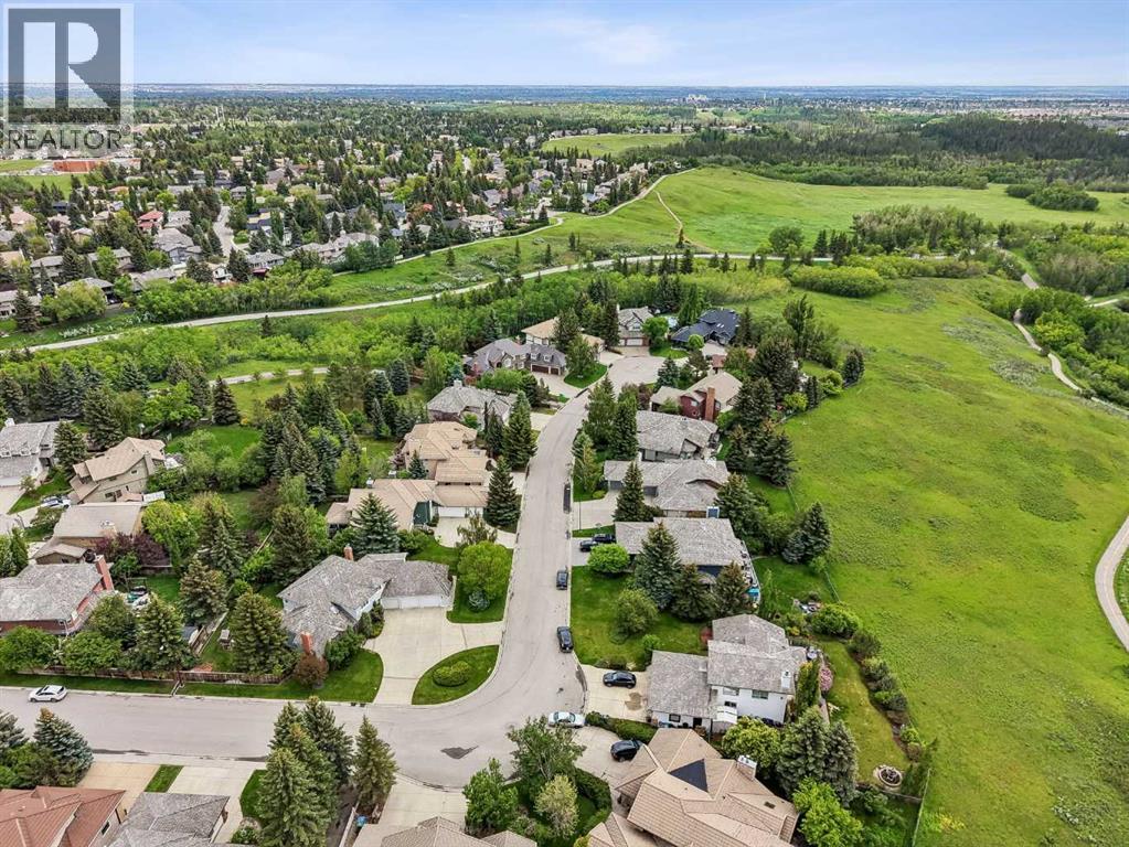 65 Woodpath Terrace SW, Calgary, Alberta  T2W 5Z5 - Photo 4 - A2320982