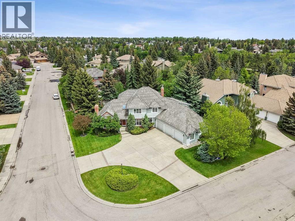 65 Woodpath Terrace SW, Calgary, Alberta  T2W 5Z5 - Photo 3 - A2320982