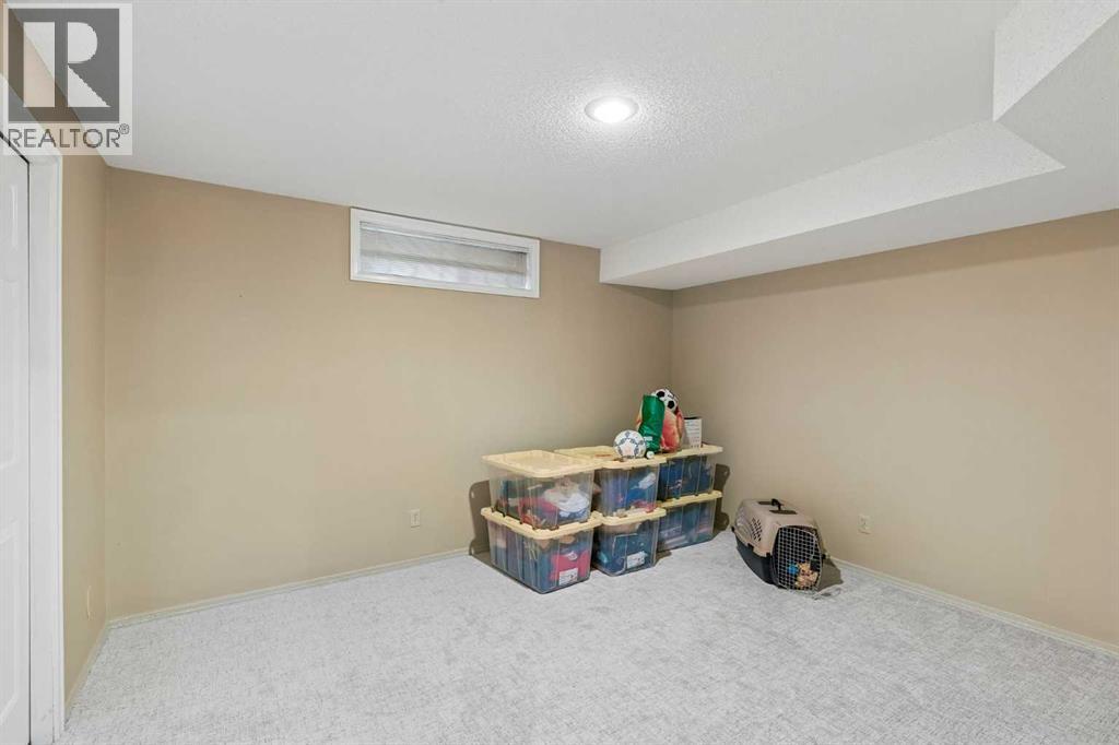 65 Woodpath Terrace SW, Calgary, Alberta  T2W 5Z5 - Photo 41 - A2320982