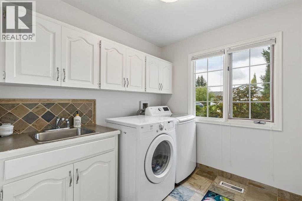 65 Woodpath Terrace SW, Calgary, Alberta  T2W 5Z5 - Photo 24 - A2320982