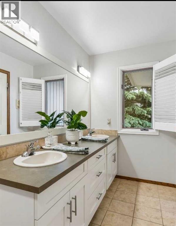 65 Woodpath Terrace SW, Calgary, Alberta  T2W 5Z5 - Photo 36 - A2320982