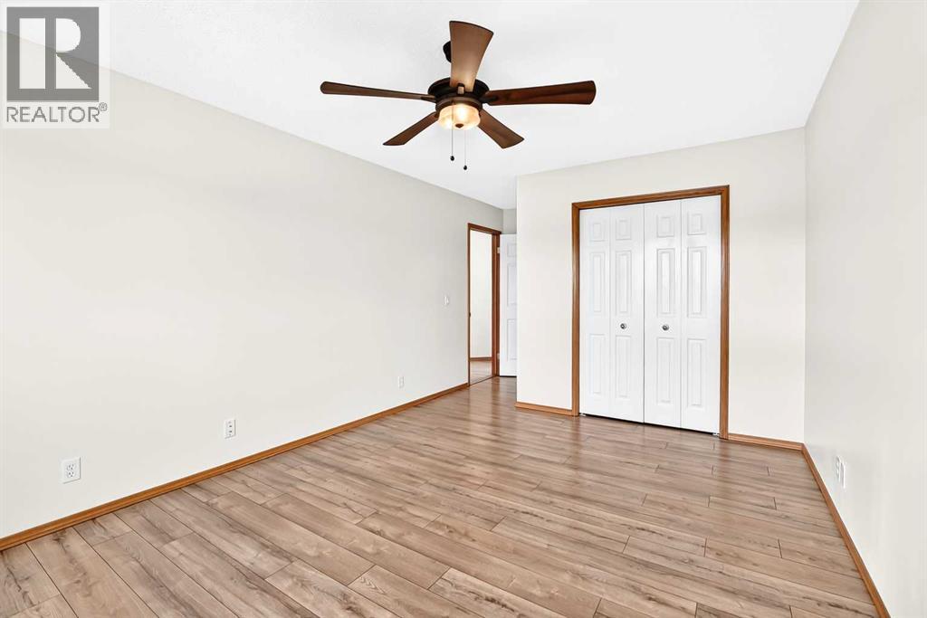 142 Quigley Close, Cochrane, Alberta  T4C 1S4 - Photo 19 - A2321780