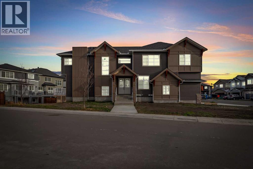 203 Kinniburgh Place, Chestermere, Alberta  T1X 1Y1 - Photo 3 - A2322935