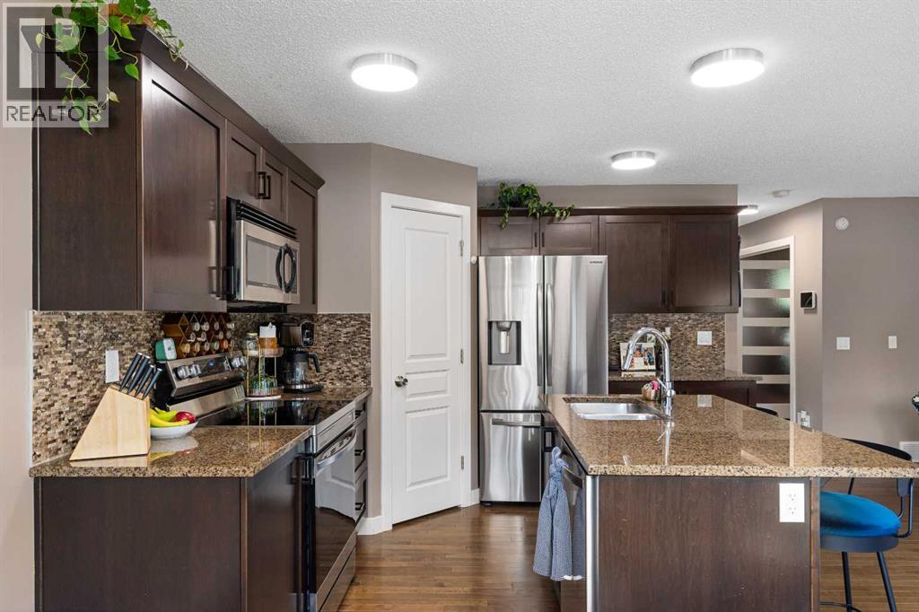 2067 Luxstone Boulevard Sw, Airdrie, Alberta  T4B 0J8 - Photo 6 - A2322057