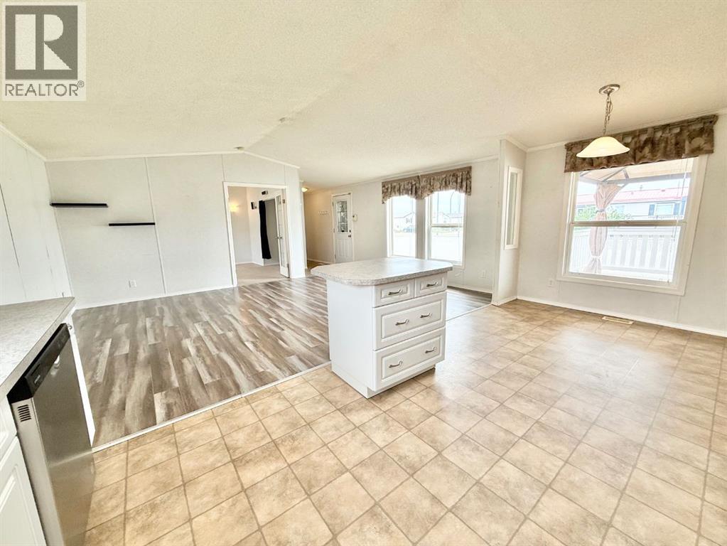 56 Meadowplace Crescent E, Brooks, Alberta  T1R 0R5 - Photo 8 - A2316445