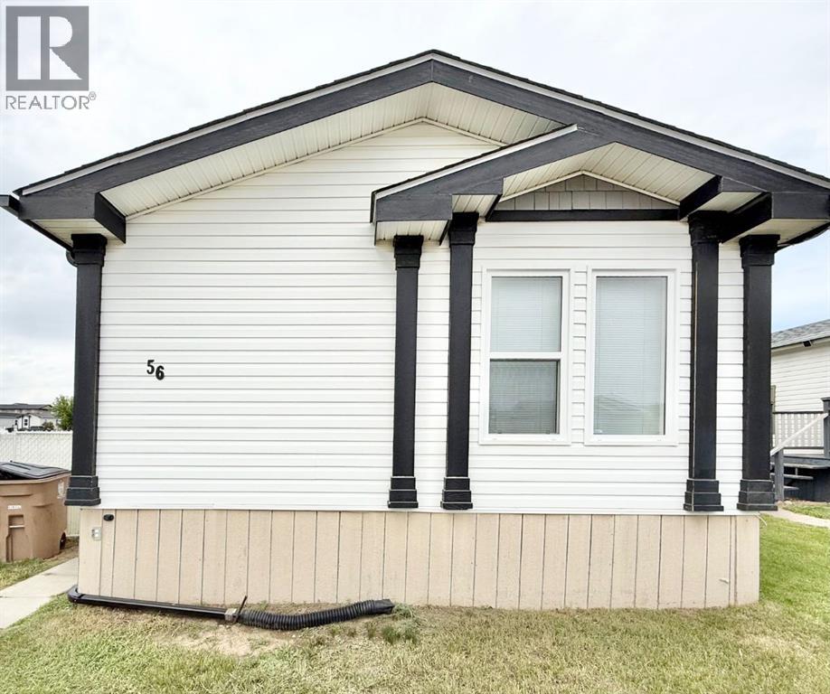 56 Meadowplace Crescent E, Brooks, Alberta  T1R 0R5 - Photo 2 - A2316445
