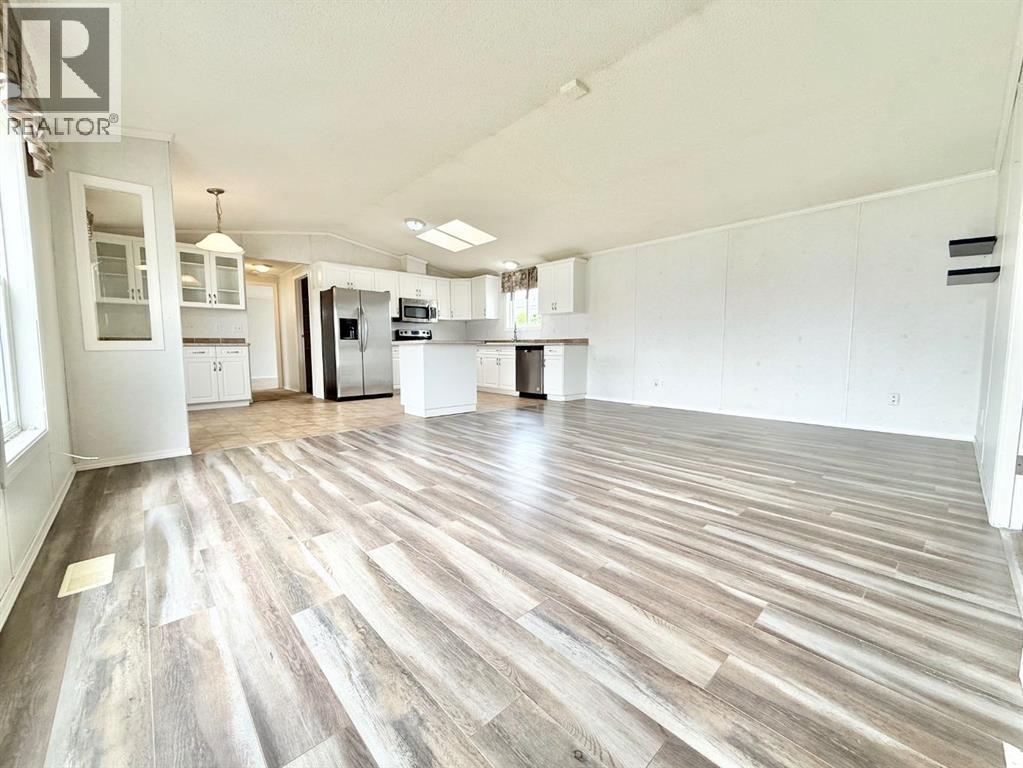 56 Meadowplace Crescent E, Brooks, Alberta  T1R 0R5 - Photo 6 - A2316445