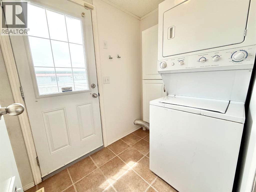 56 Meadowplace Crescent E, Brooks, Alberta  T1R 0R5 - Photo 23 - A2316445