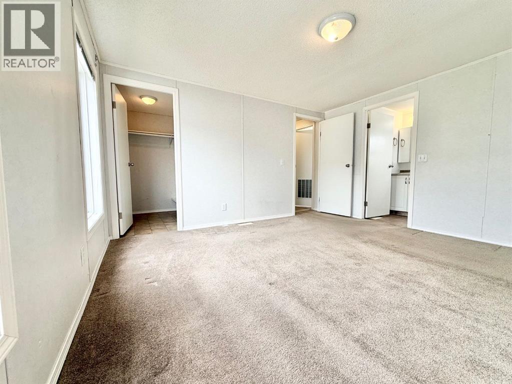 56 Meadowplace Crescent E, Brooks, Alberta  T1R 0R5 - Photo 25 - A2316445